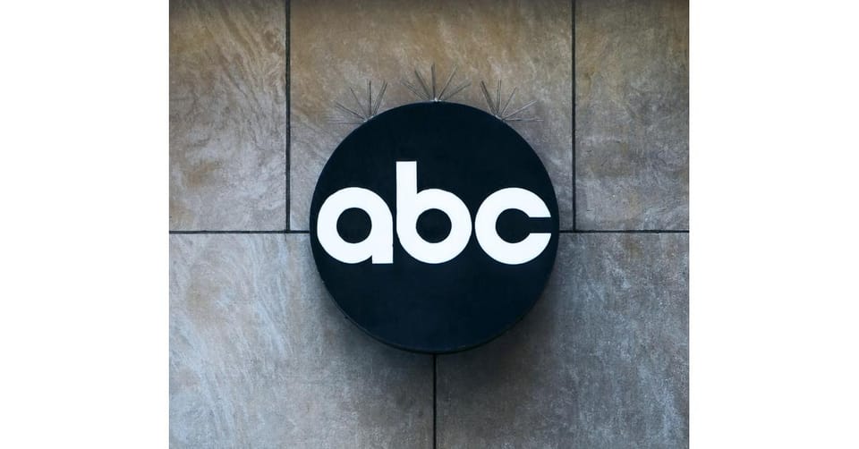 ABC News logo on a building wall. The network faced backlash in June 2025 after firing correspondent Terry Moran over a social media post criticizing Donald Trump and Stephen Miller.